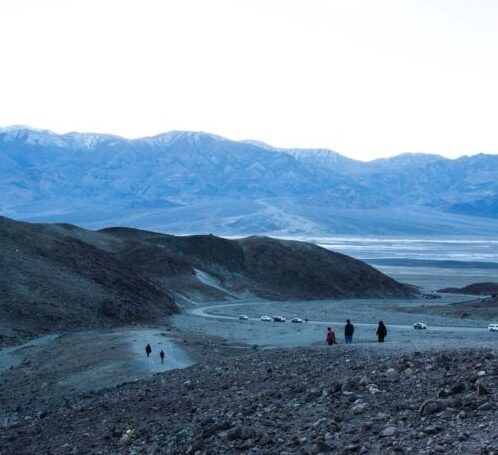 Scene in Death Valley with a group of people walking