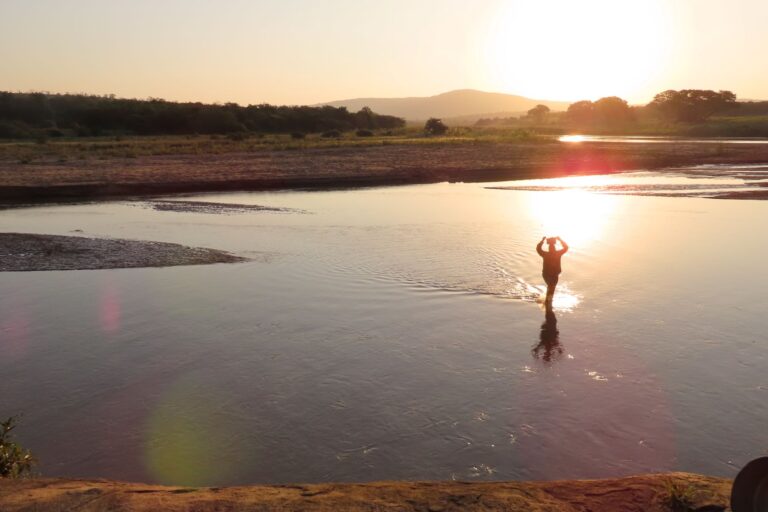 Sicelo Mbatha crosses the Imfolozi river